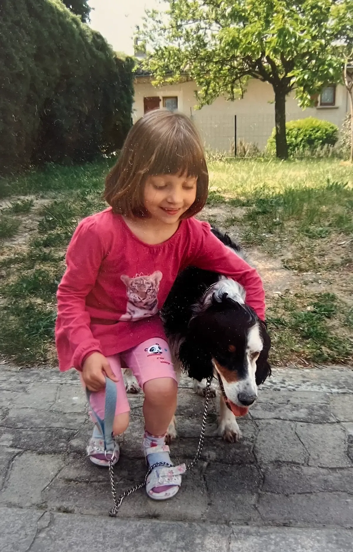 Emily playing with a dog